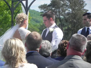 Close-up of groom during wedding vows