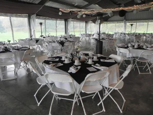 Elegant black and silver pavilion setup for wedding reception