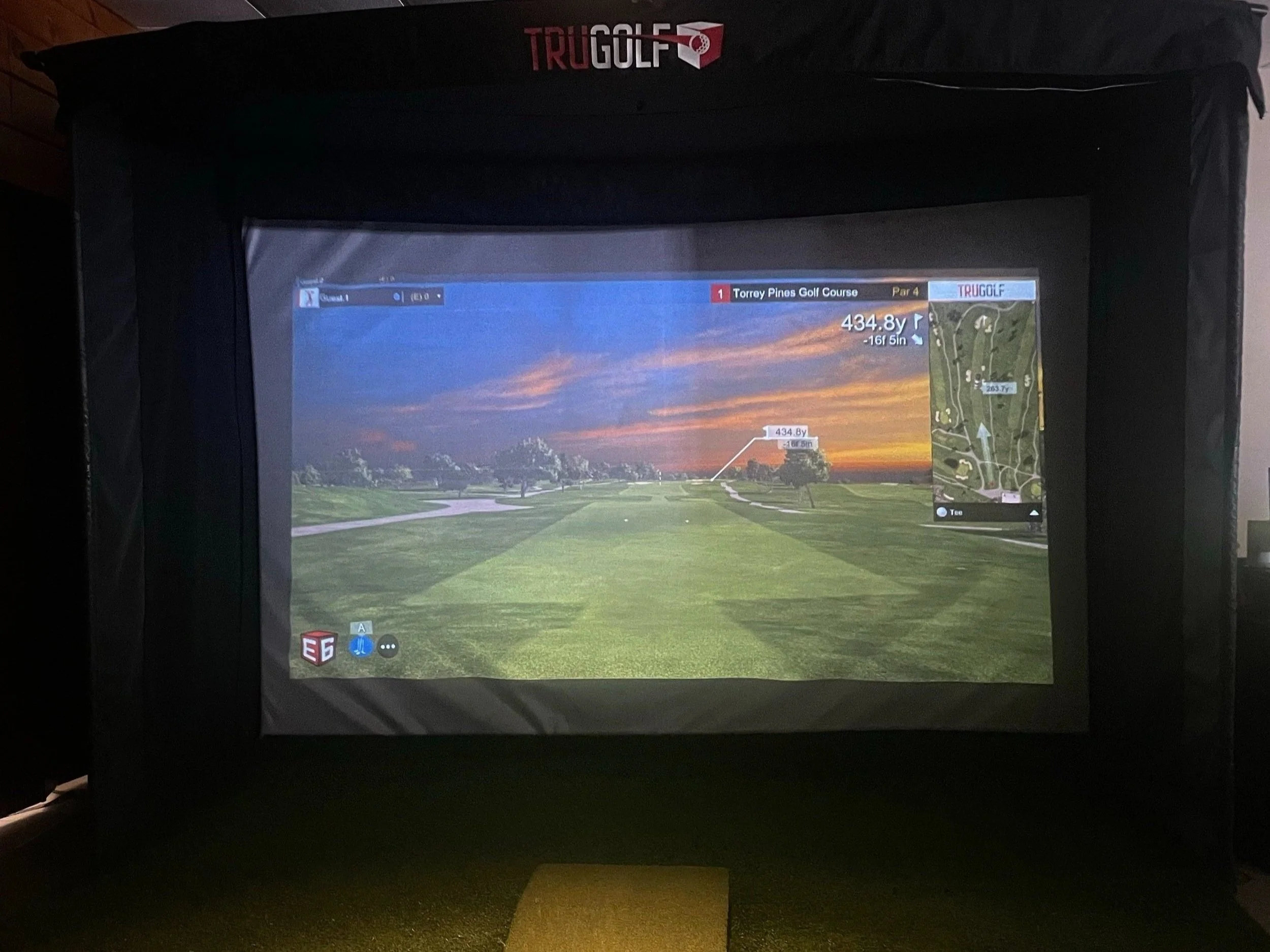 TruGolf indoor golf simulator screen active at Genegantslet Golf Club